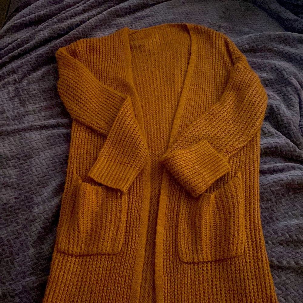 Camel color long duster sweater.